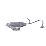 Decorative Silver peacock on a white background
