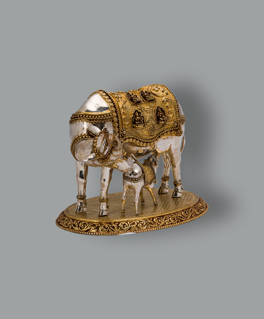 Cow and Calf – Kamadhenu with Ashta Lakshmi in Silver with Gold Polish