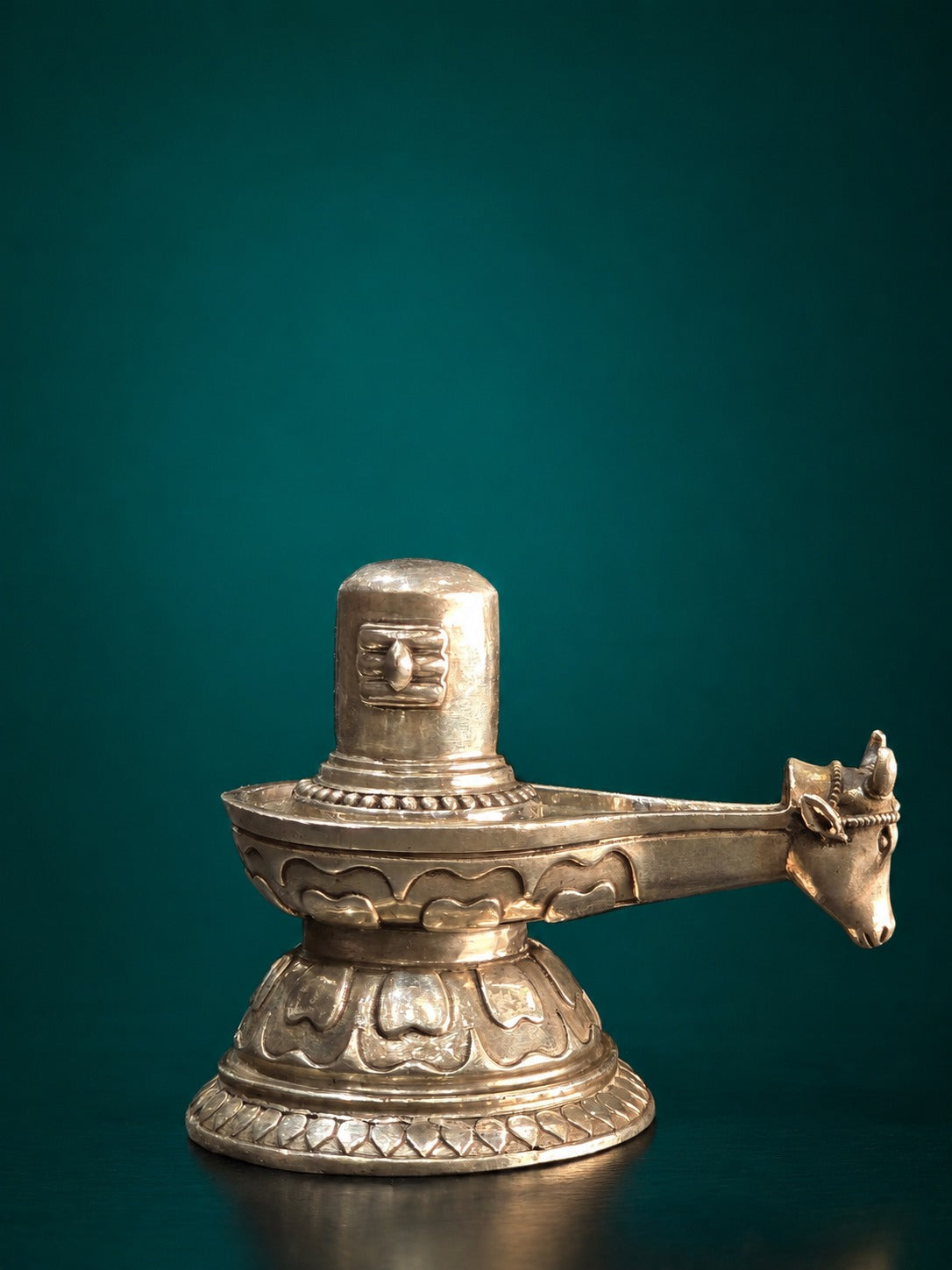 Silver Shiva lingam on stand with Nandi bull head ornament, metallic finish