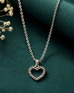 Silver heart-shaped pendant necklace