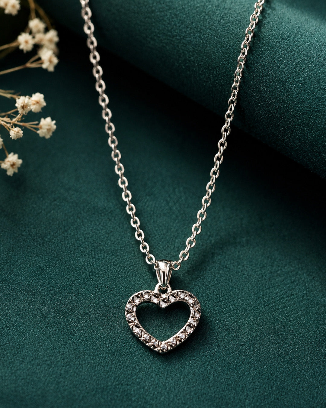 Silver heart-shaped pendant necklace