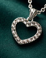Silver heart-shaped pendant necklace