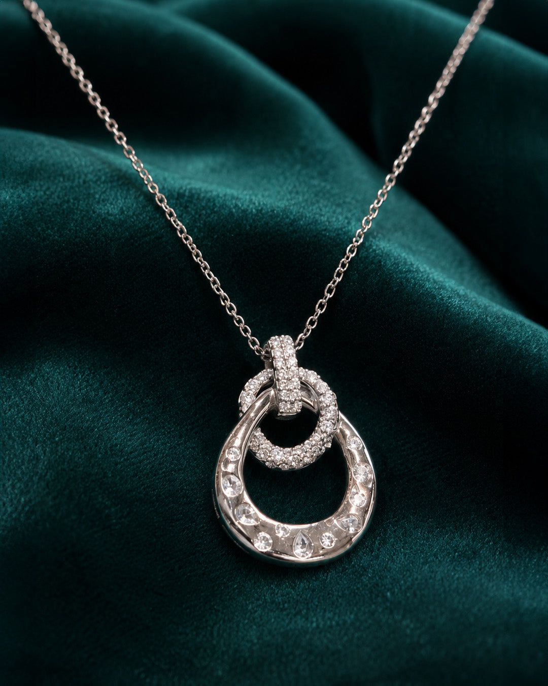 Silver pendant with diamond accents