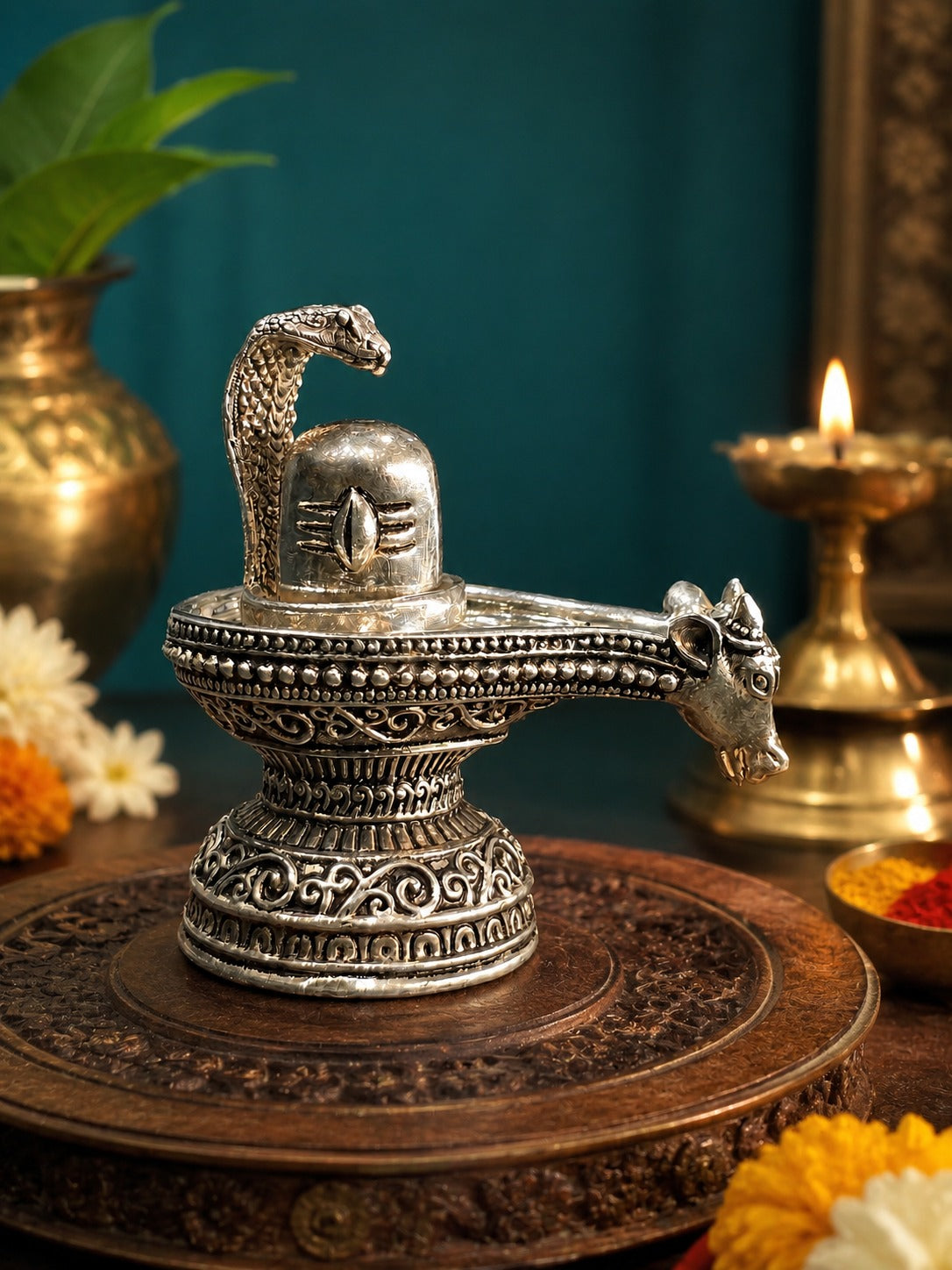 Silver Shiva lingam figure with cobra hood, Nandi head on spout, decorative banding