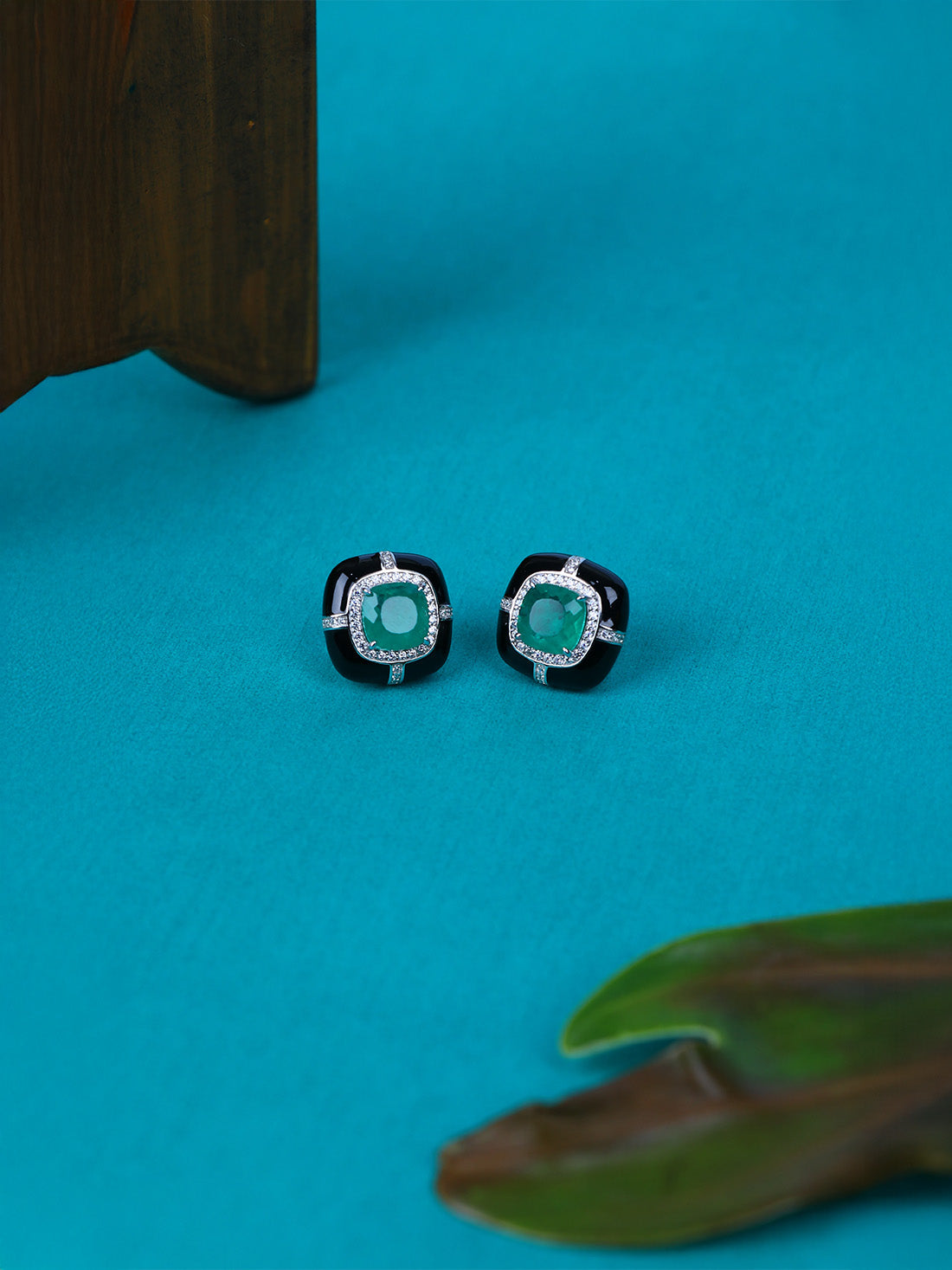 Shop pair of black enamel stud silver earrings with greenstone