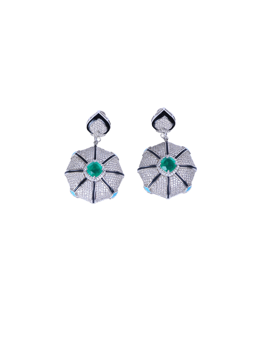 Shop a pair of silver drop earrings featuring a flower-shaped pave setting with a central green emerald and a small light blue stone at the base.