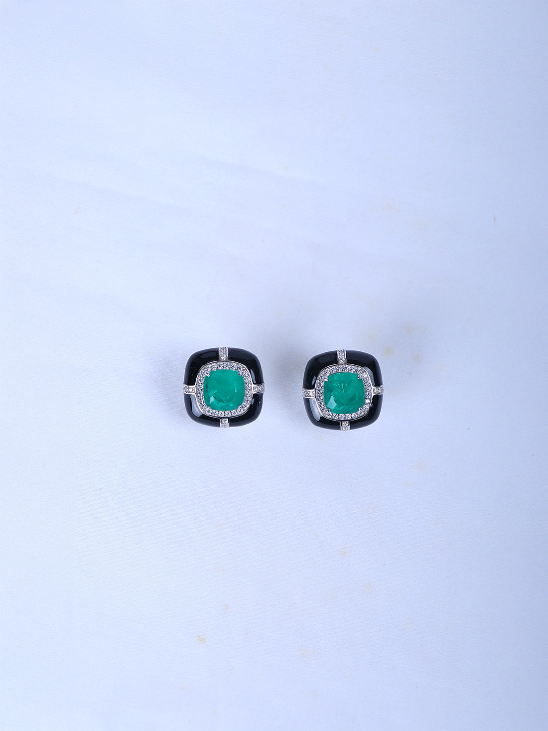 Shop 925 silver black enamel stud earrings with greenstone.