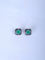 Shop 925 silver black enamel stud earrings with greenstone.