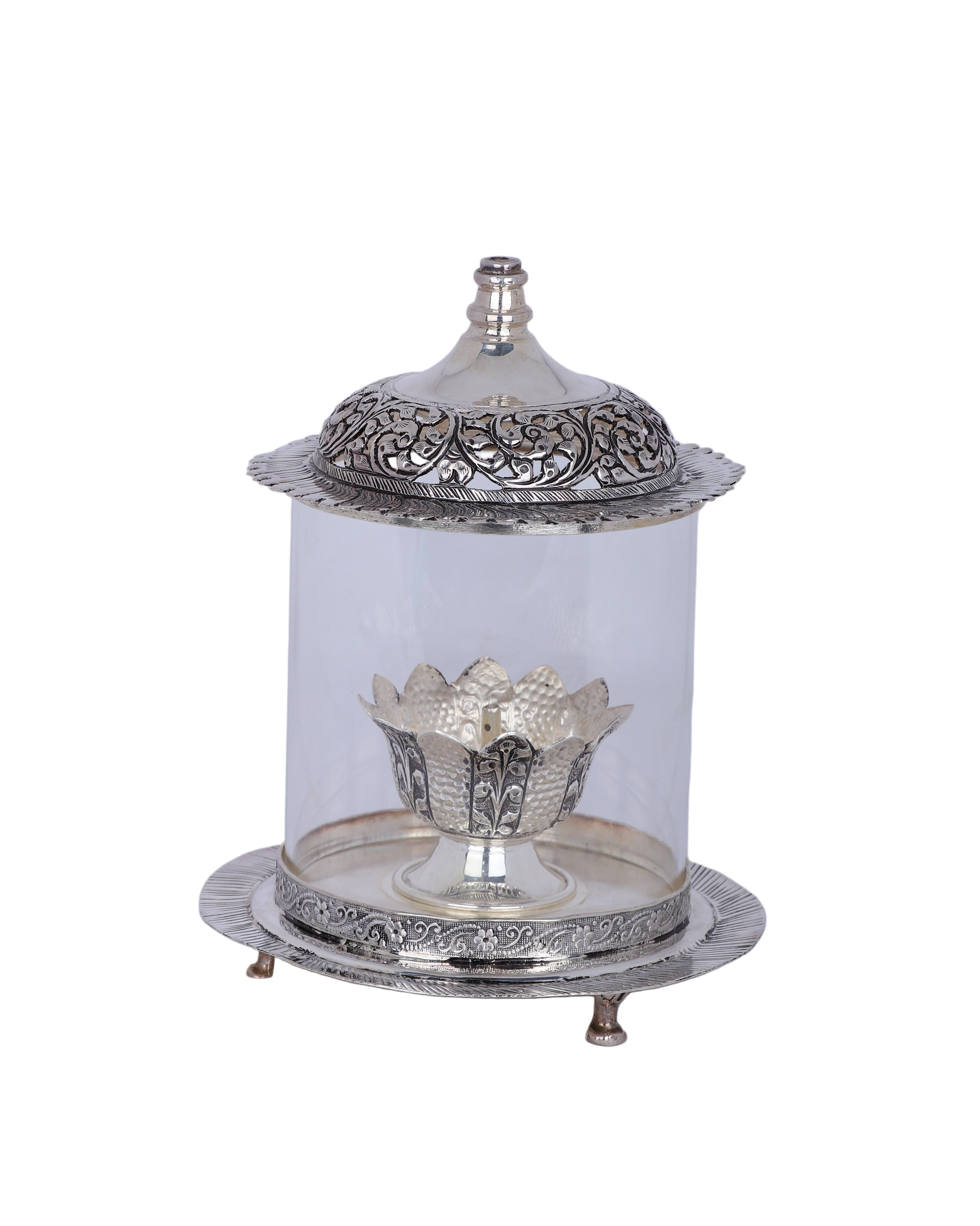 Silver decorative item with a clear glass cover on a white background