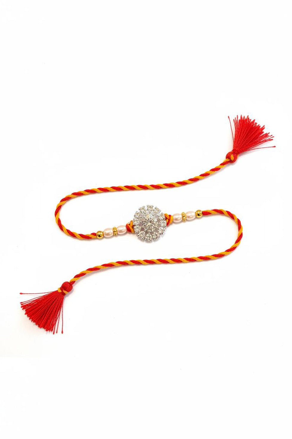 Sterling silver floral rakhi with pearl beads and red tassels, braided red thread