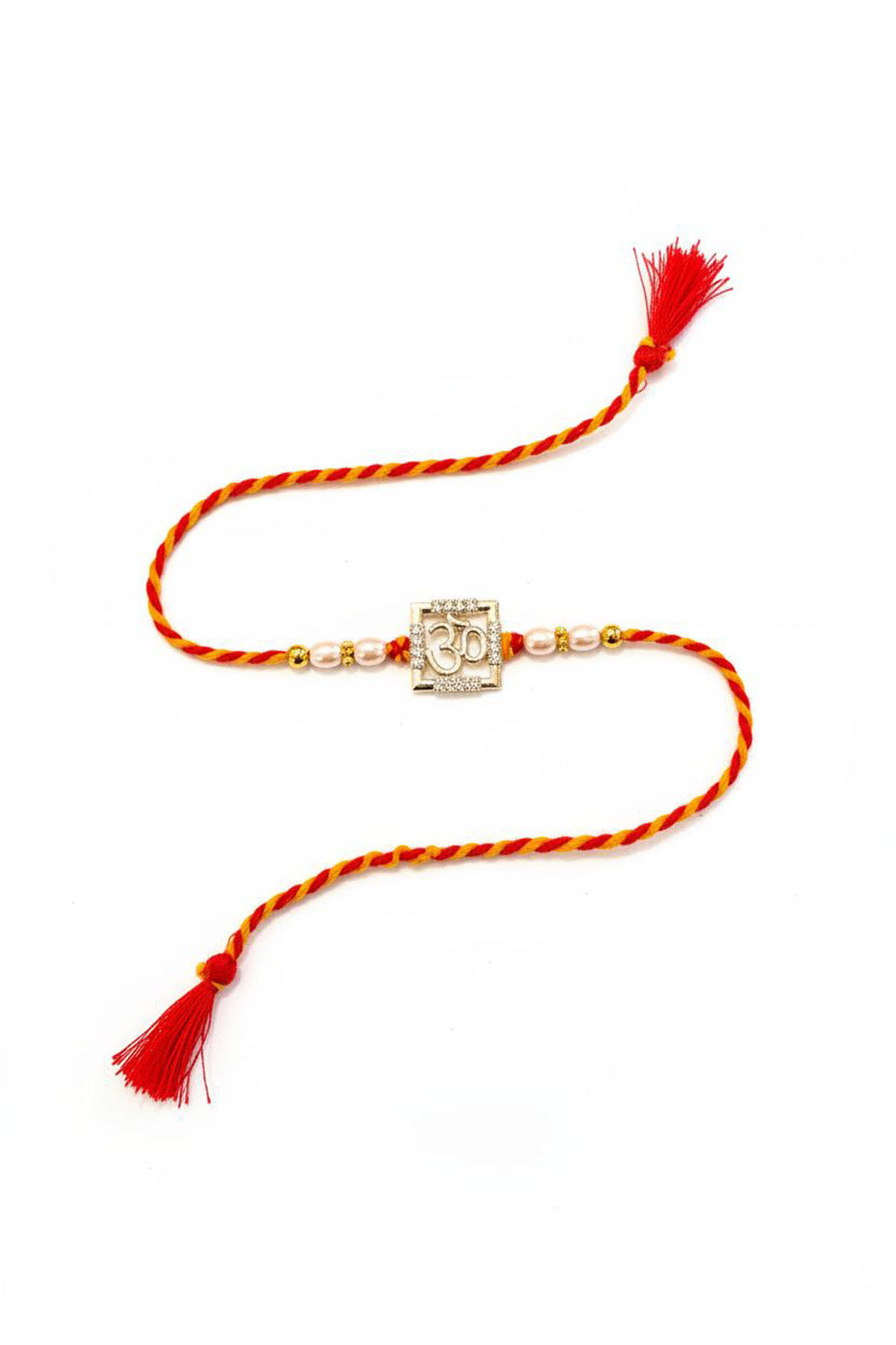 Om square sterling silver rakhi with pearl beads, red thread and tassels