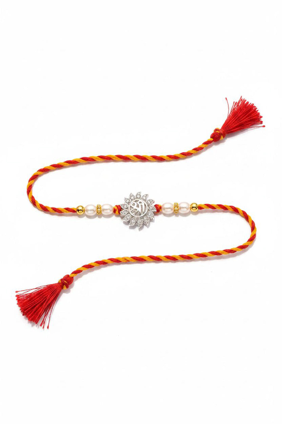 Sterling silver rakhi with red-yellow braided thread, tassels, and round filigree charm