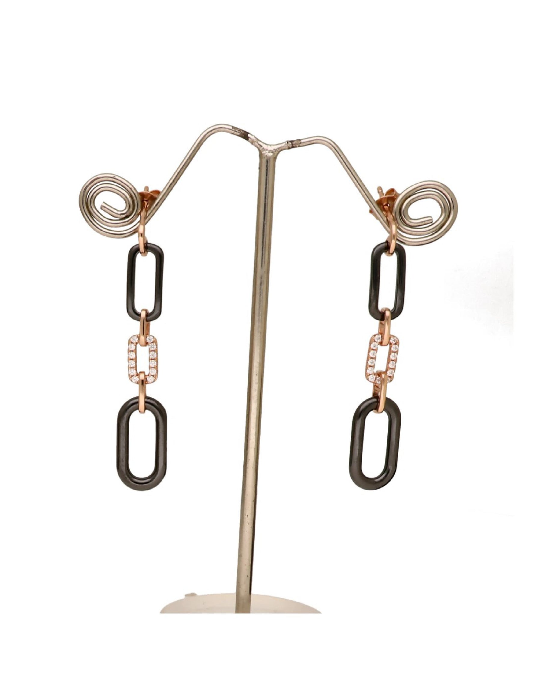 Buy women’s silver drop earrings with black geometric links and a rose-gold finish online.