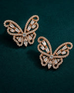 Buy butterfly silver earrings for women with sparkling crystals and a rose-gold finish online.