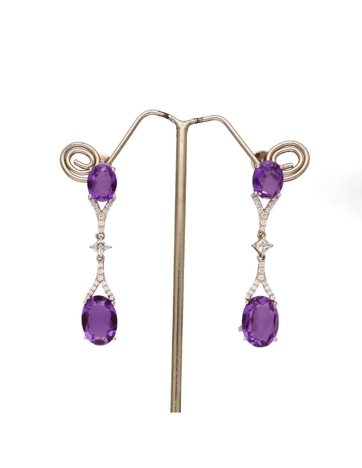 Buy women’s silver drop earrings with oval purple stones and sparkling crystal detailing online.