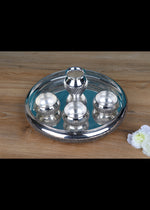 Silver-plated pooja thali set with kalash centerpiece and four small bowls on round tray
