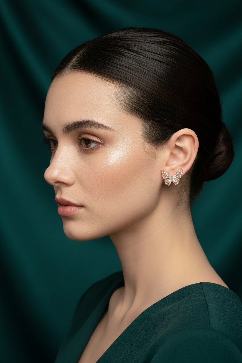 Crystal-studded butterfly silver stud earrings for women with elegant marquise and baguette stones.