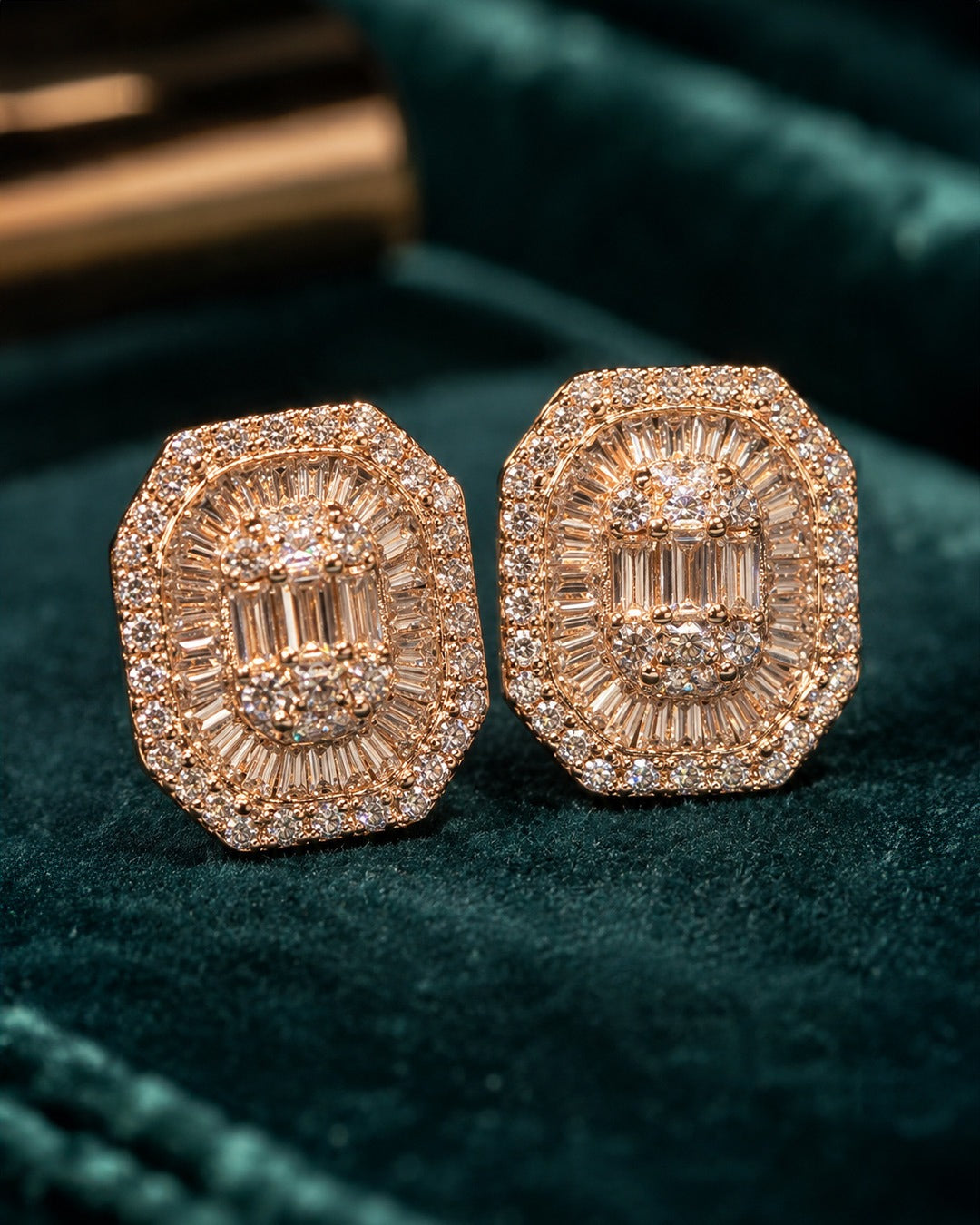 Designer silver earrings for women in octagon stud style with brilliant clear crystal finish.