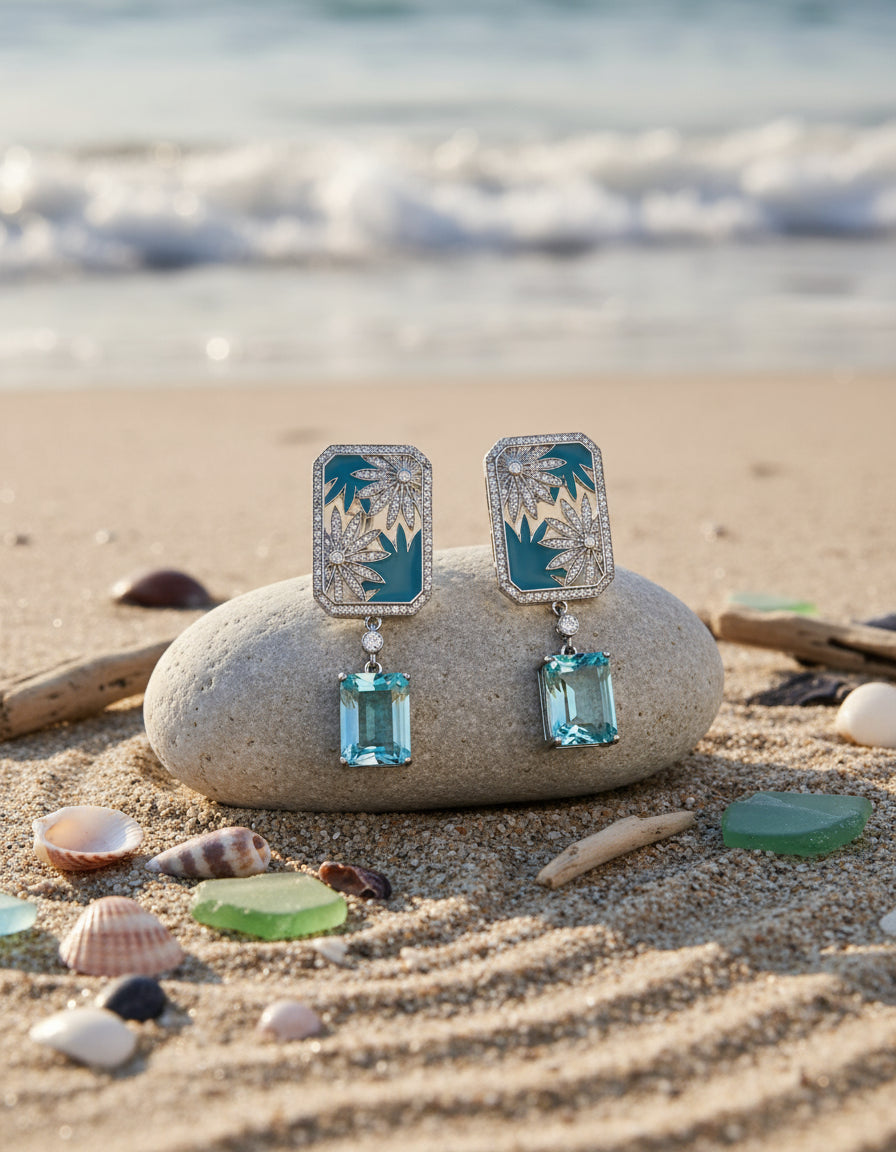 Pair of rectangular silver earrings with turquoise-blue enamel, floral motifs and hanging blue stones