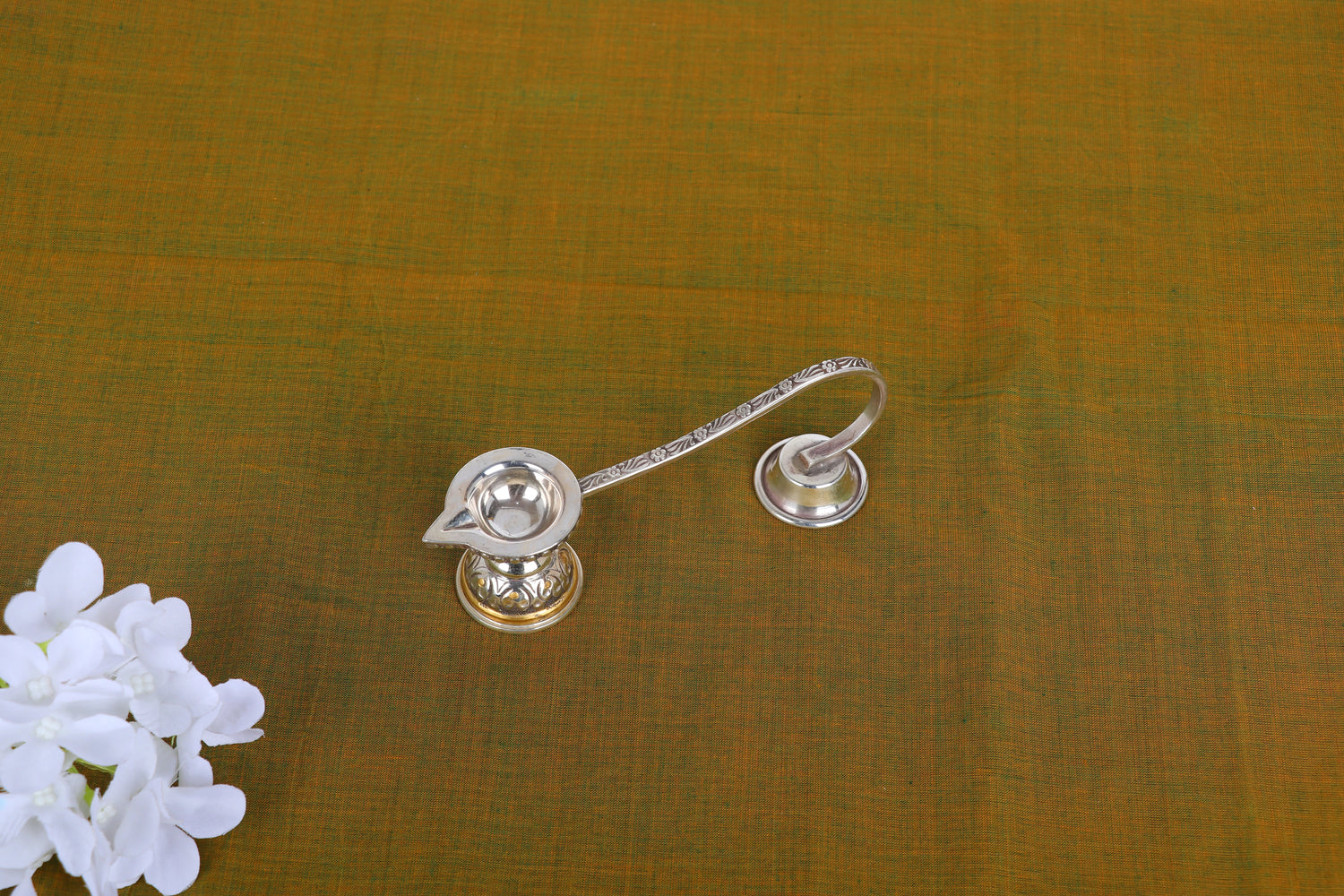Silver-plated aarti diya oil lamp, close top view of both cup holders