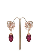 Floral silver drop earrings with sparkling crystals and deep pink stone drops
