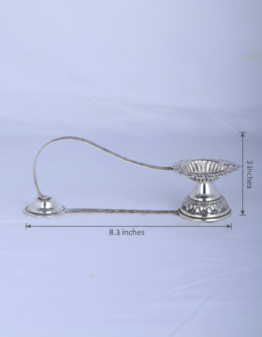 Silver aarti diya lamp with long handle, lotus-petal wick holder, single cup