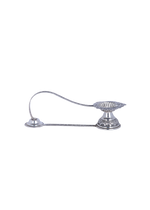 Silver candle holder with a long arm on a white background