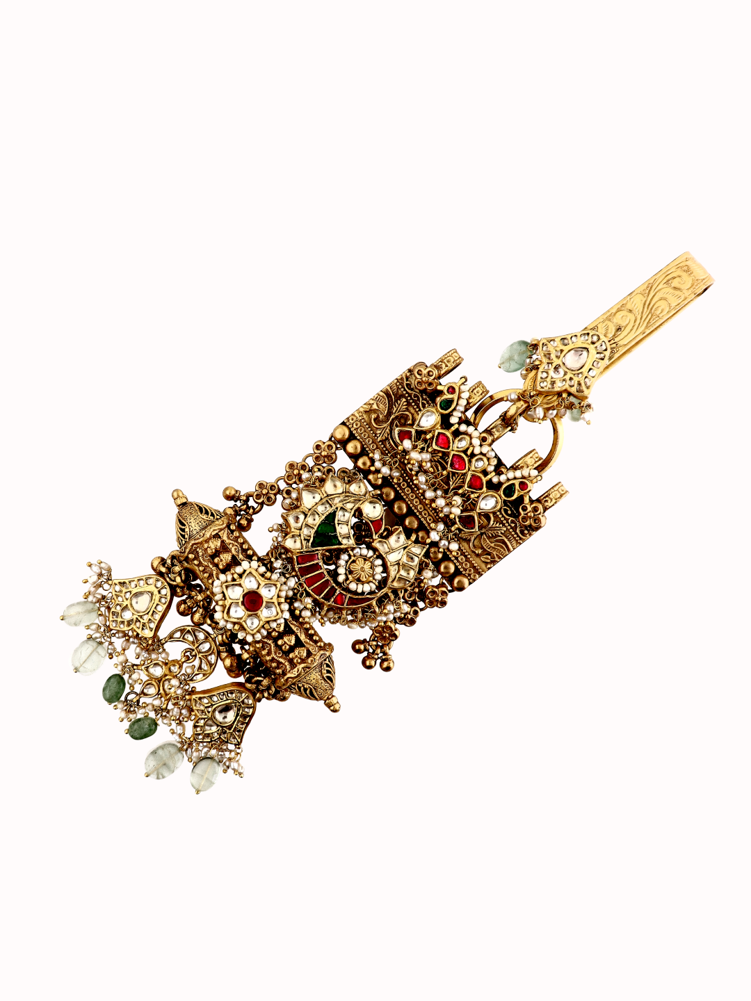 Ornate silver keychain with gold color filigree, red and green stones, dangling charms