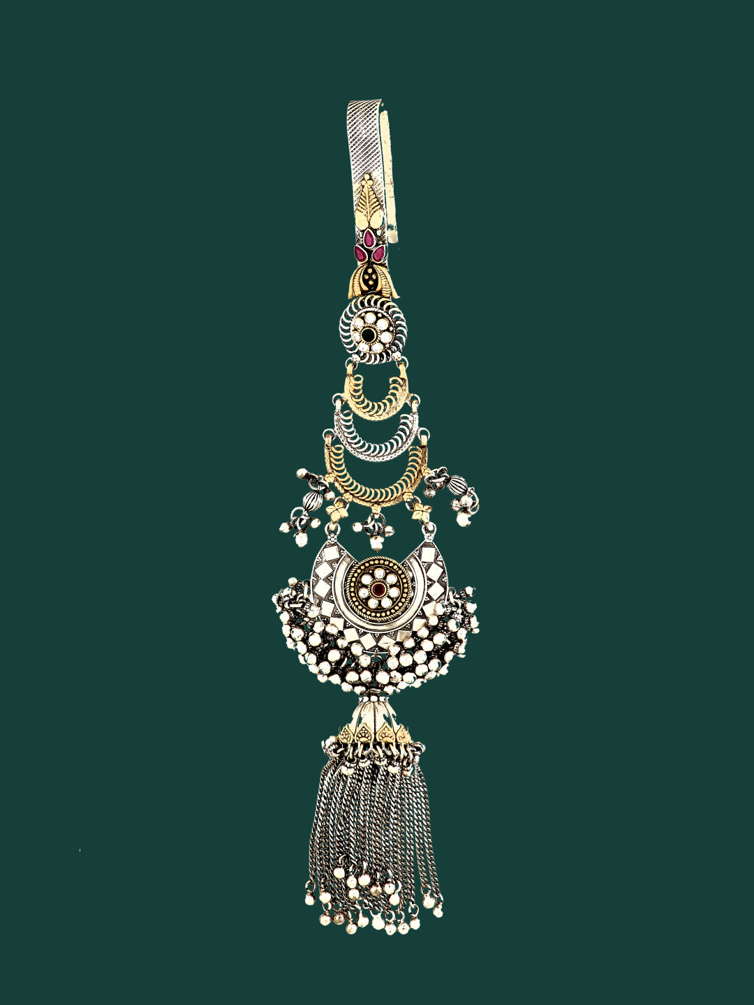 Ornate silver keychain with layered pendants and hanging tassel