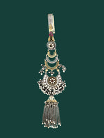 Ornate silver keychain with layered pendants and hanging tassel