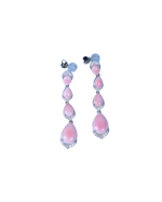 Shop pink teardrop earrings on a blue background.