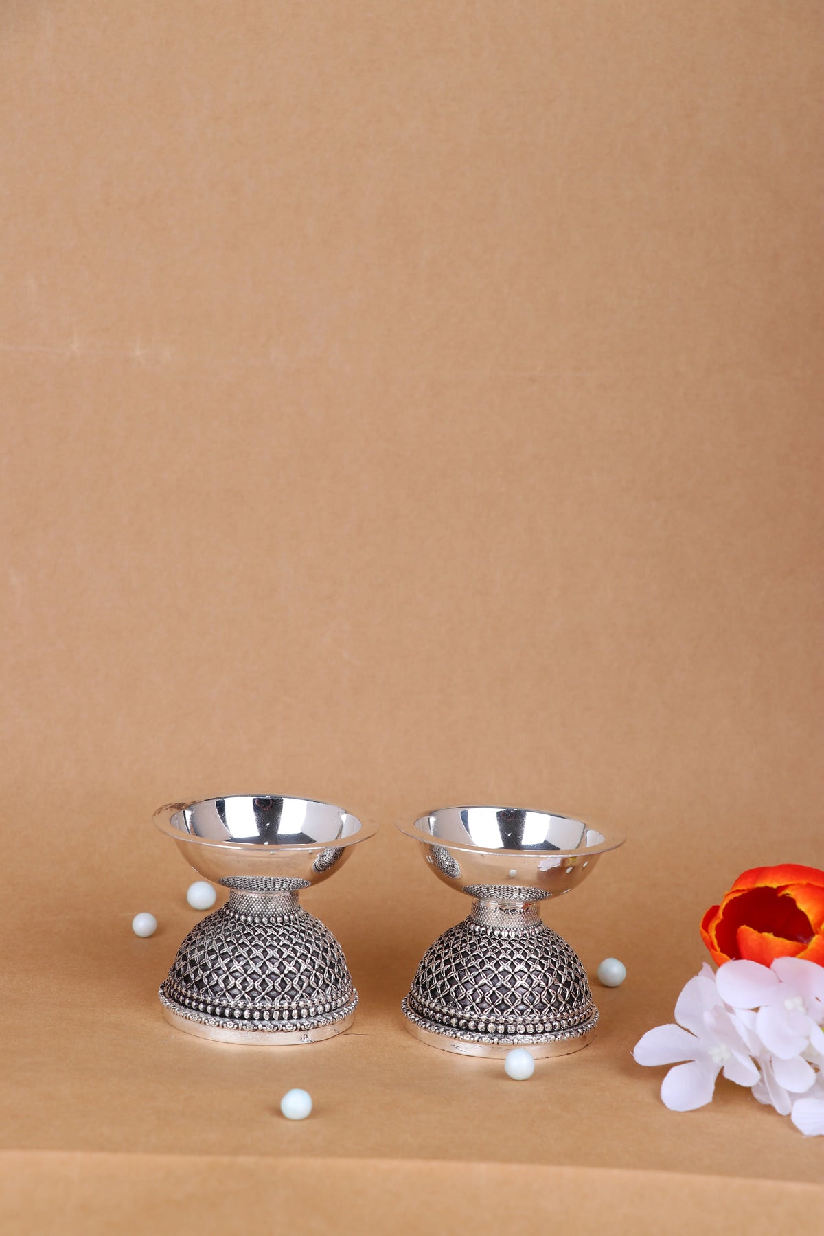 925 silver diya pair with ornate oxidized base and shiny domed cup tops