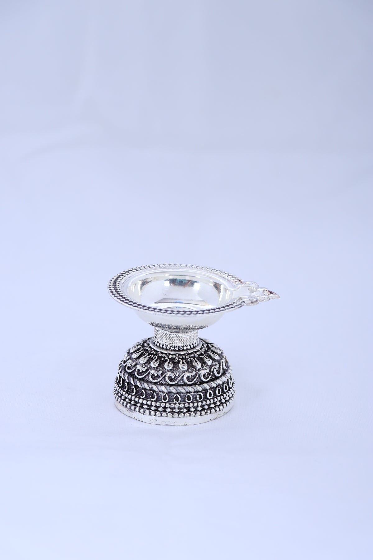 925 silver compact diya pair with ornate oxidized band detailing and domed flame cups