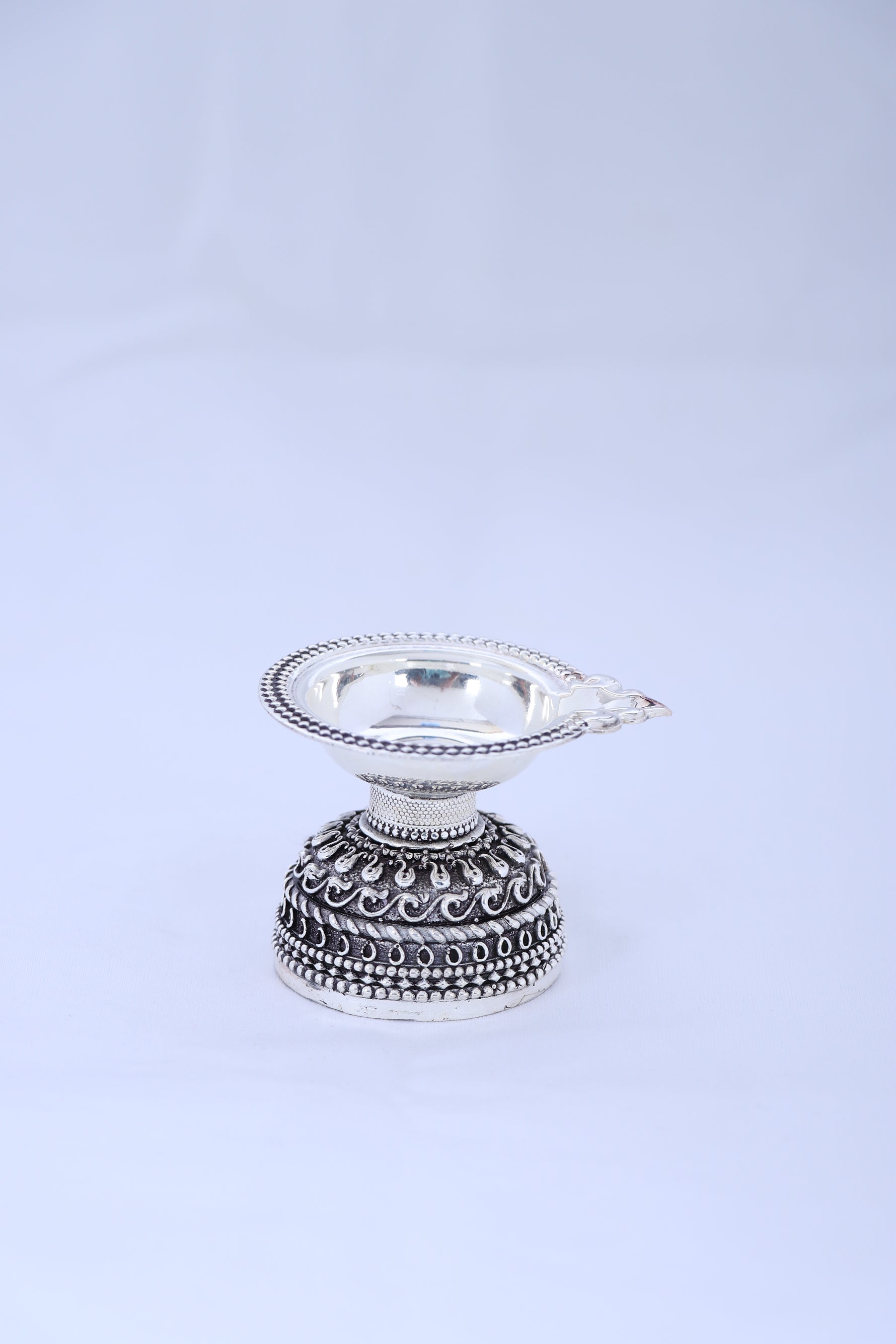 925 silver compact diya pair with ornate oxidized band detailing and domed flame cups