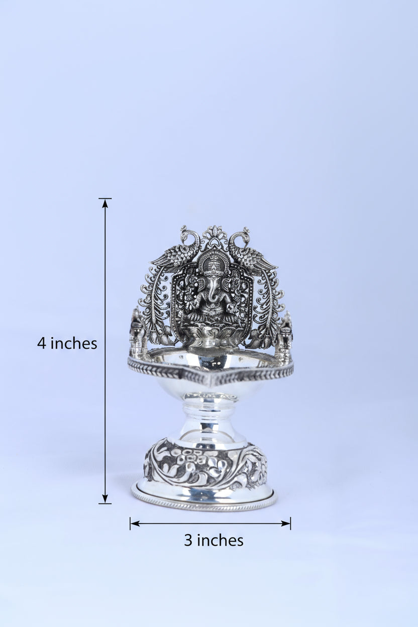 925 silver Ganesha diya lamp with ornate arch back and glossy pedestal stand