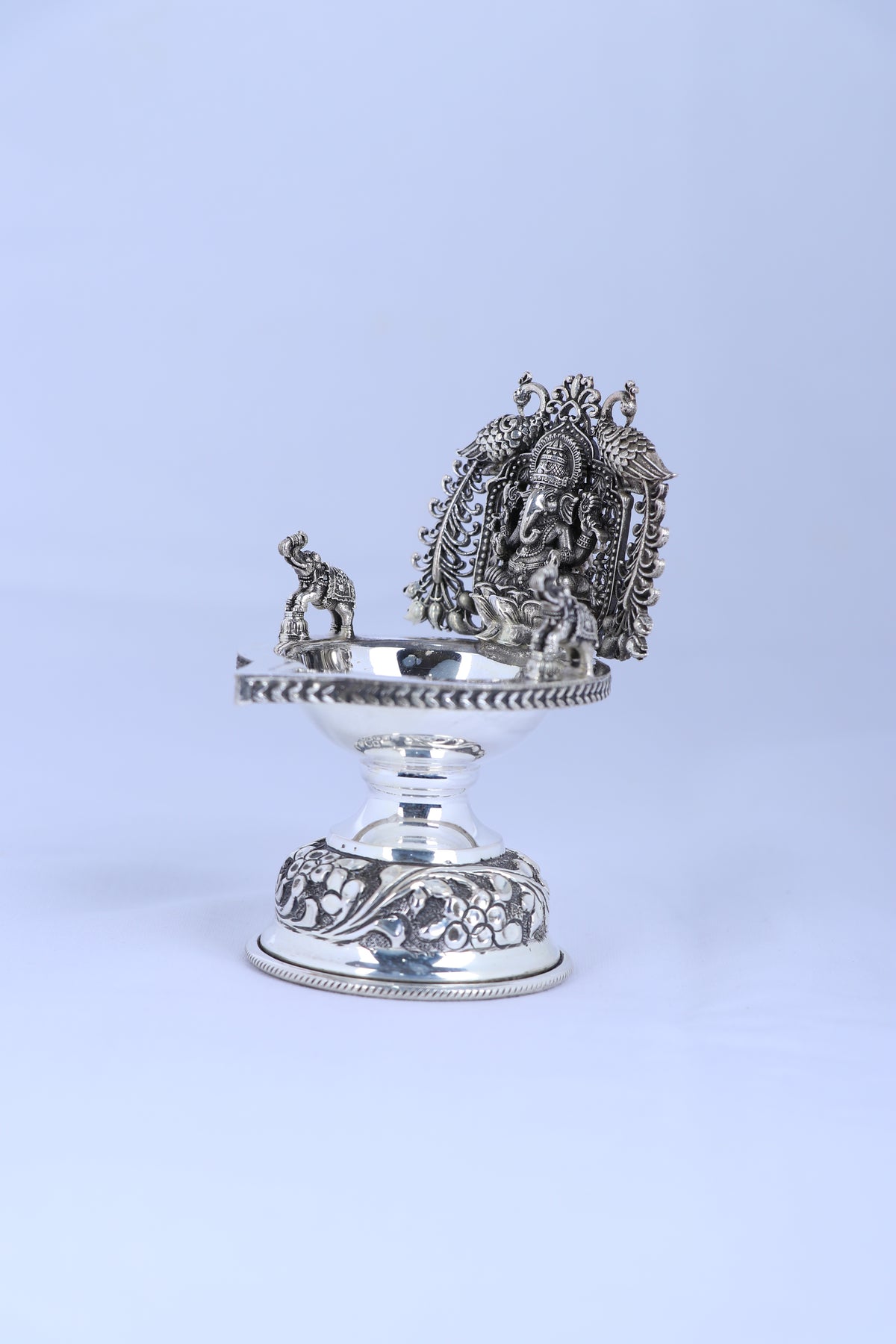 925 silver Ganesha diya lamp with detailed prabhavali and wide rim bowl