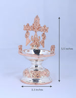 Silver-toned Lakshmi diya, 5.5 in tall; 3.3 in wide, round oil bowl on pedestal