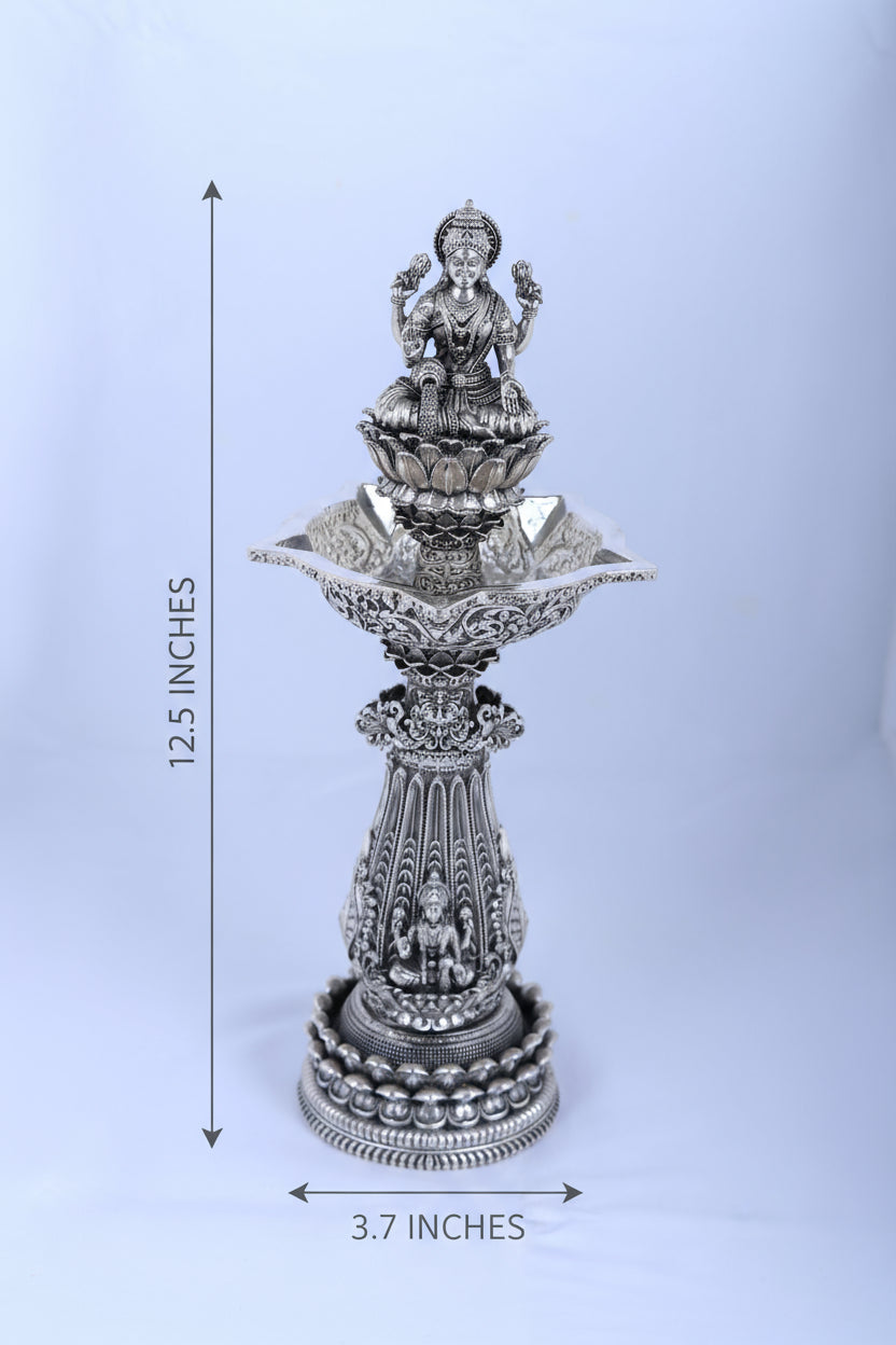 Silver deity diya stand, 12.5 in tall with decorative tiered base and lamp plate