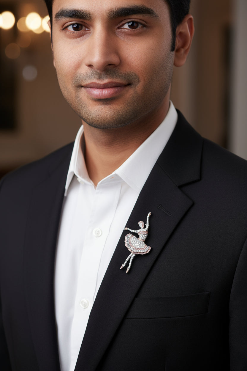 Pure silver dancer brooch with shimmering crystals worn on a black suit lapel