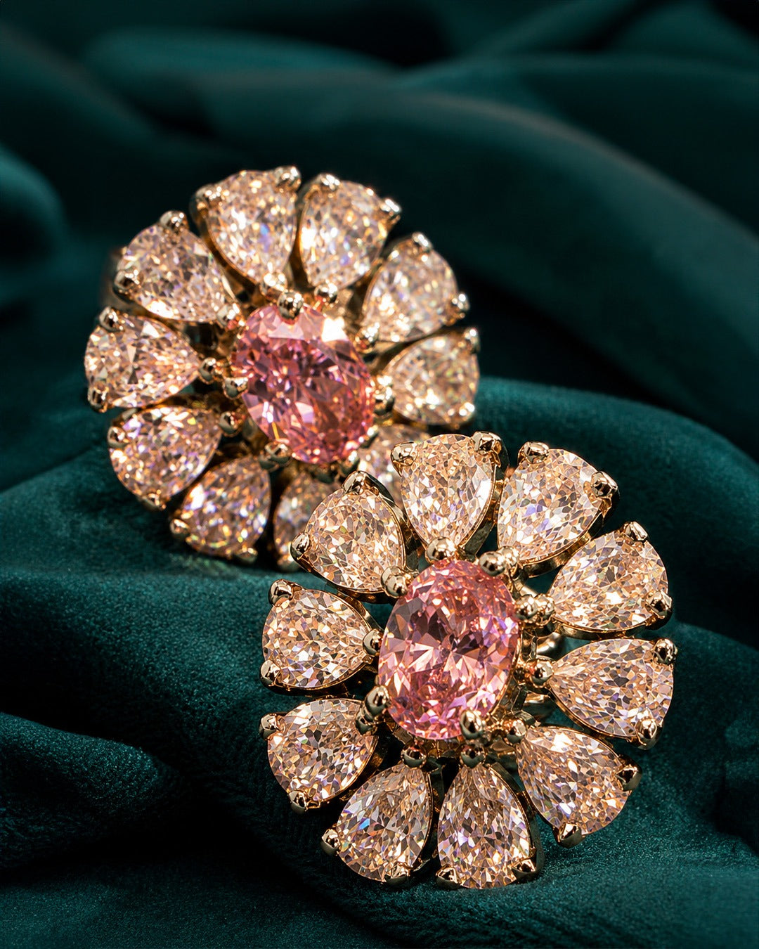 Pure silver flower earrings for women featuring an oval pink stone surrounded by clear teardrop crystals.