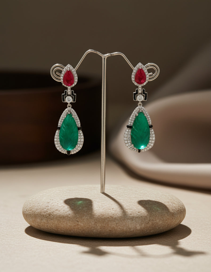 Pure silver long earrings for women featuring red and green teardrop stones with sparkling crystal borders.
