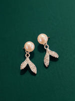 Buy silver earrings for women with pearl studs and elegant leaf-shaped drops online.