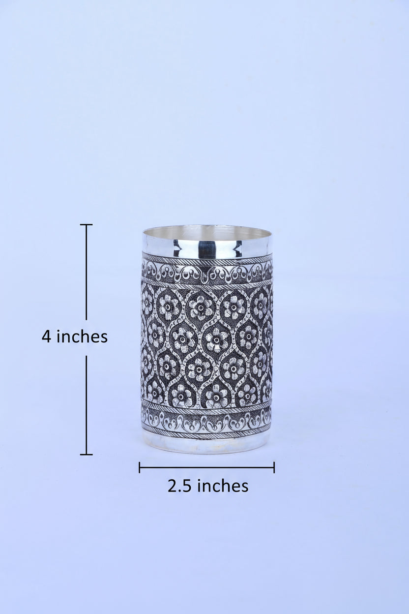 Silver fluted tumbler with dark patterned band and engraved details