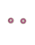 Pair of round silver earrings with pink gemstones and diamond-like elements.