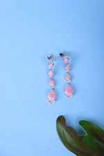 Buy pink teardrop silver earrings for women.