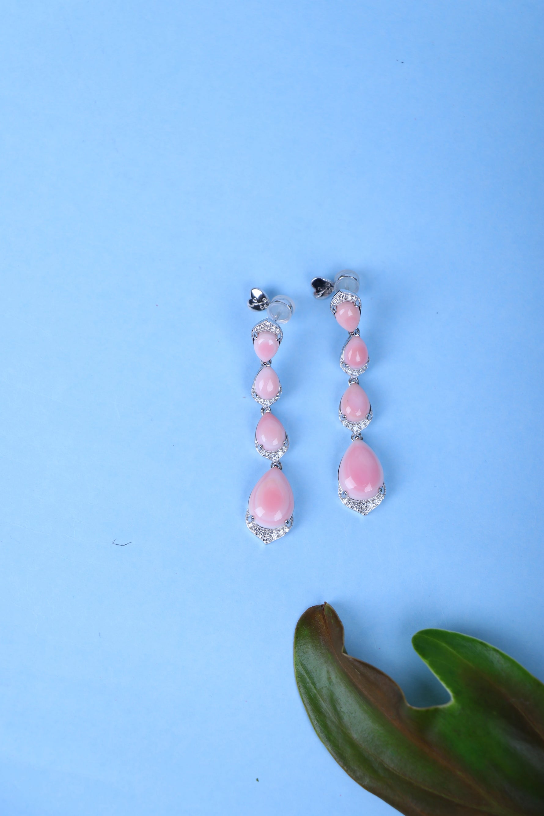 Buy pink teardrop silver earrings for women.