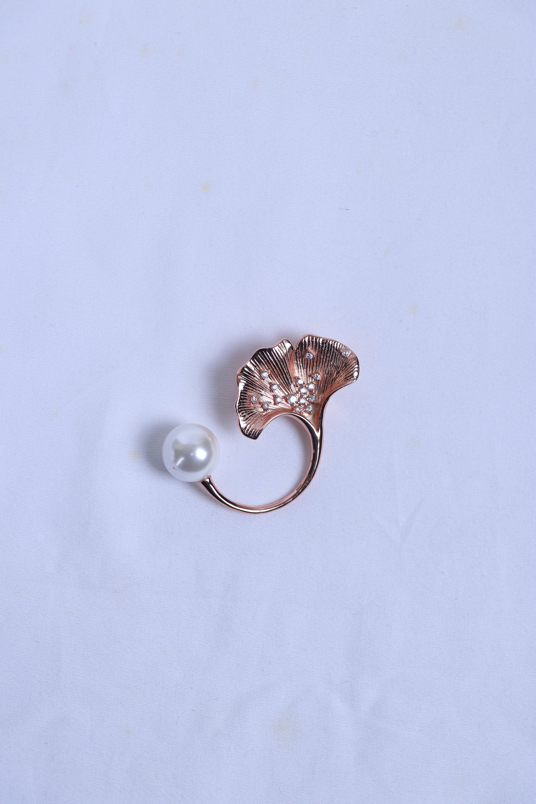 Shop silver brooch online featuring a leaf design with pearl and clear crystal detailing.