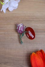 Shop silver brooch online featuring a rose design with pink and green crystal accents.