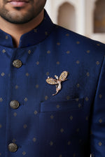 Silver lapel brooch for men with graceful bird design and crystal accents for ethnic wear.