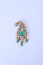 Silver brooch for men with paisley design, green stones and pearl accents for ethnic wear.